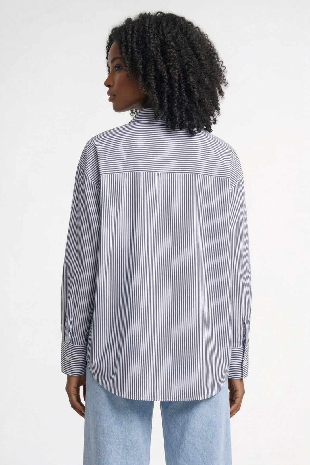 Elegante gestreepte damesblouse met volant en lange mouwen