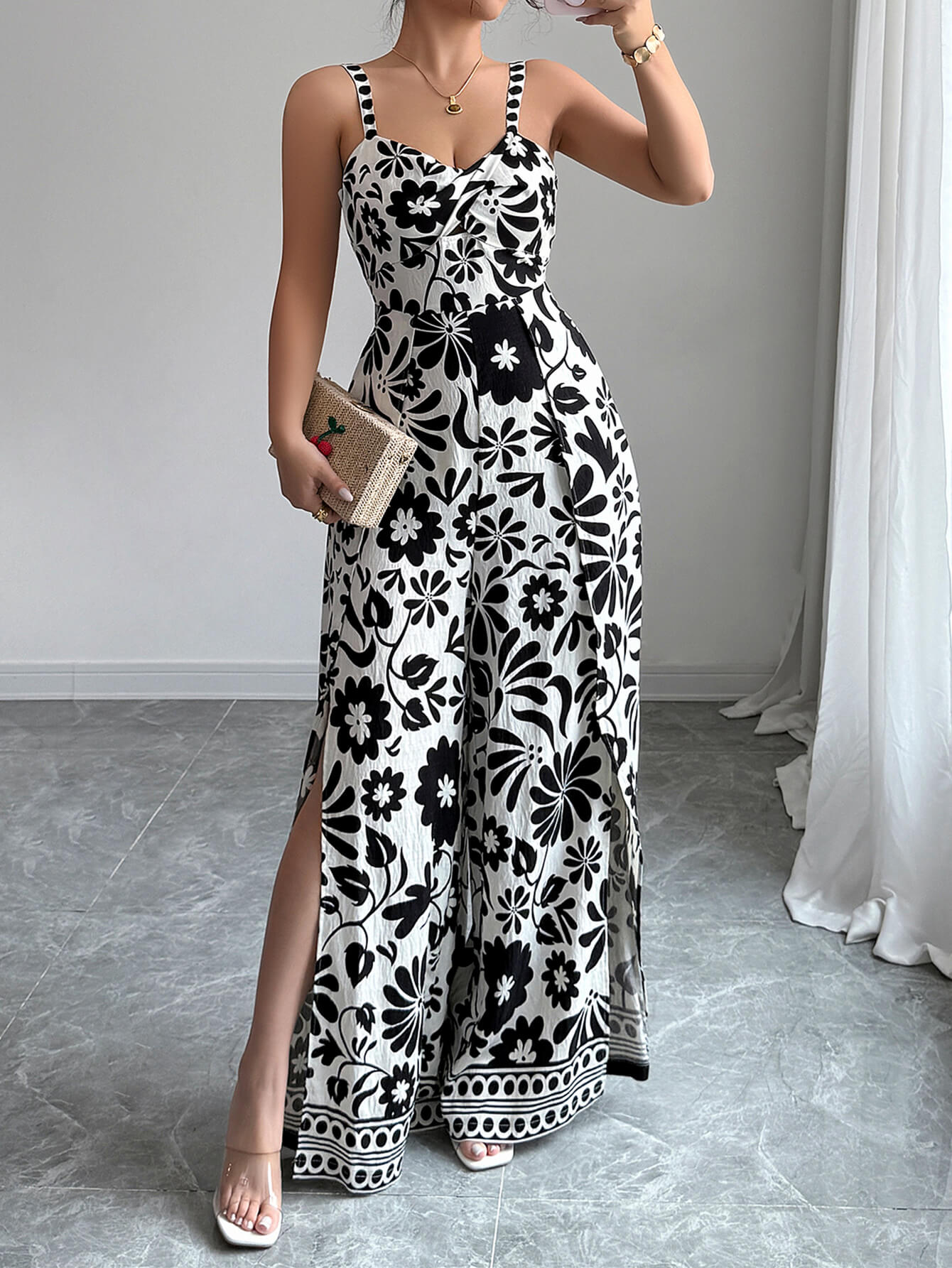 Bliss Escape Jumpsuit met Bloemenprint - Zwart