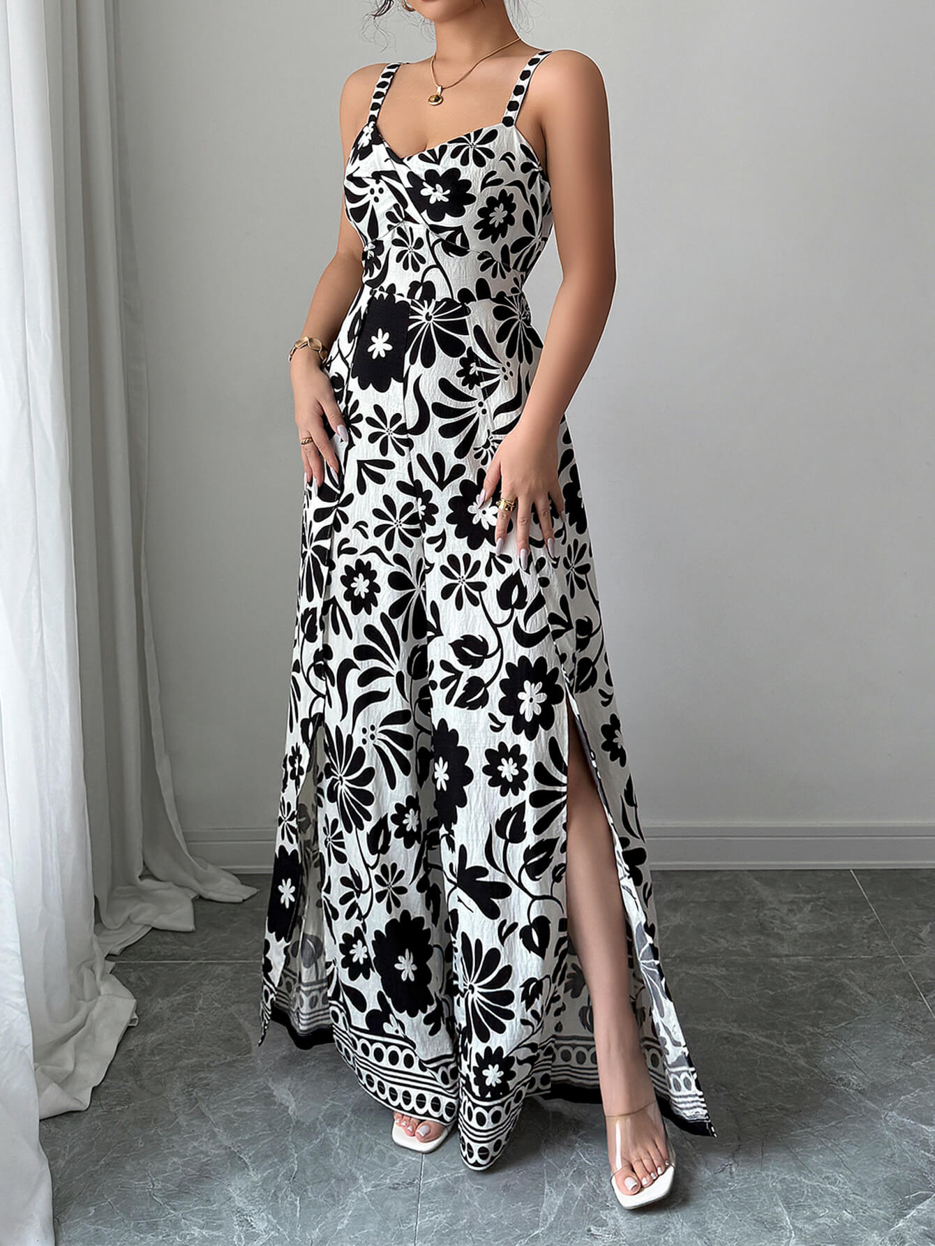 Bliss Escape Jumpsuit met Bloemenprint - Zwart