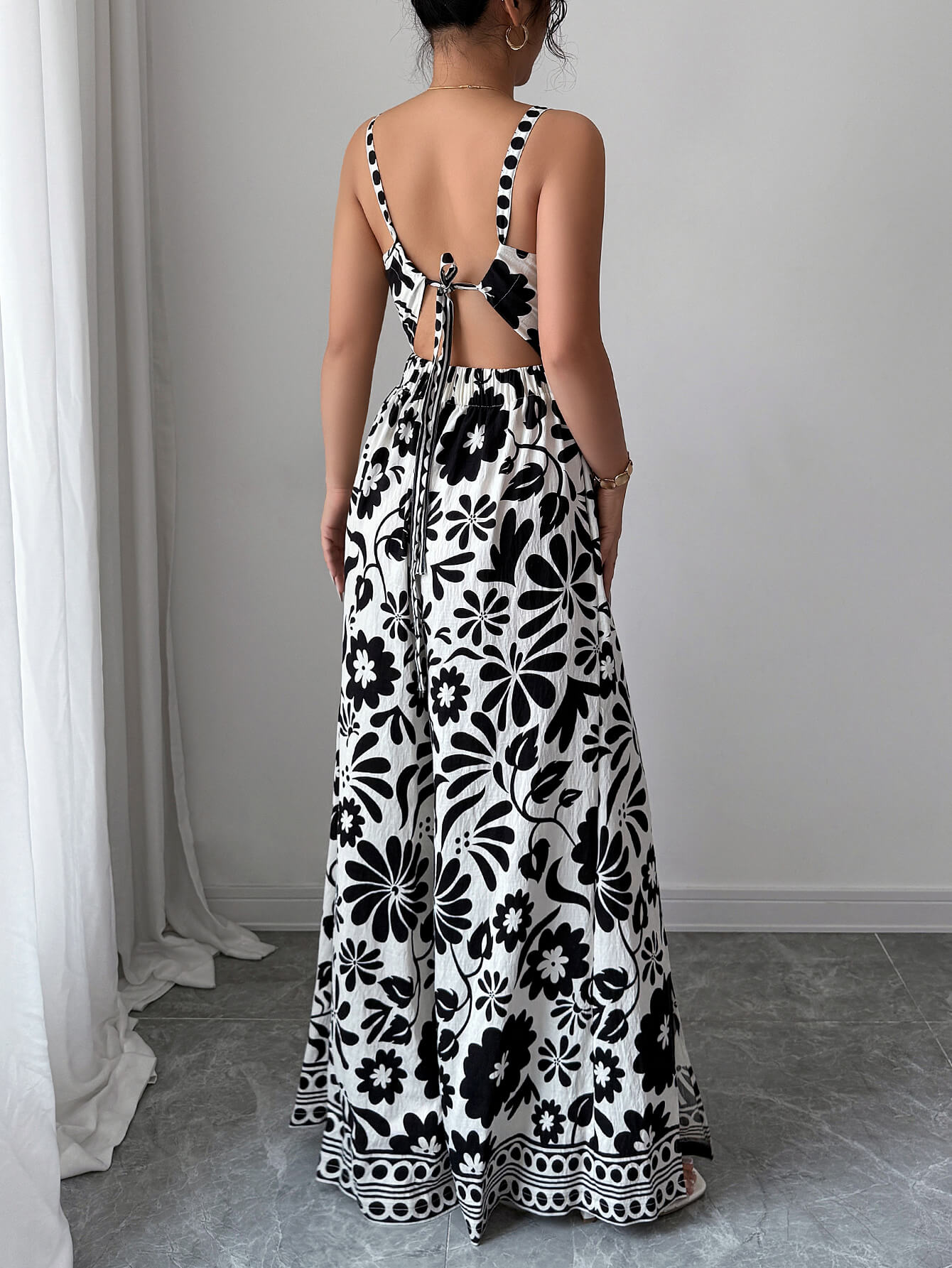 Bliss Escape Jumpsuit met Bloemenprint - Zwart