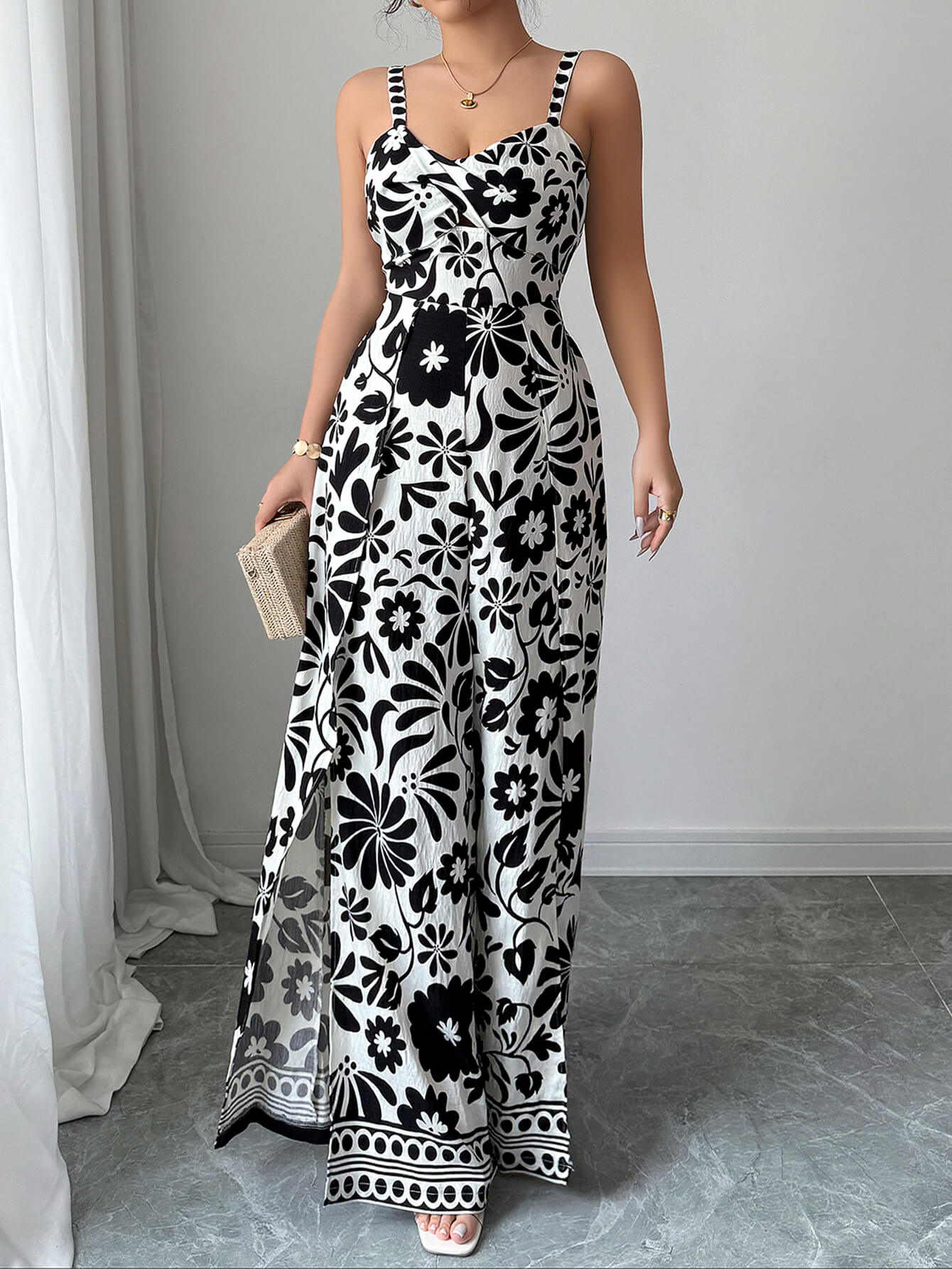 Bliss Escape Jumpsuit met Bloemenprint - Zwart