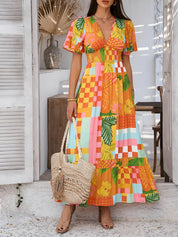 Oranje Bloemenprint Maxi Jurk | Gesmockte Taille | Tropische Zomerjurk Dames
