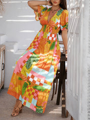 Oranje Bloemenprint Maxi Jurk | Gesmockte Taille | Tropische Zomerjurk Dames